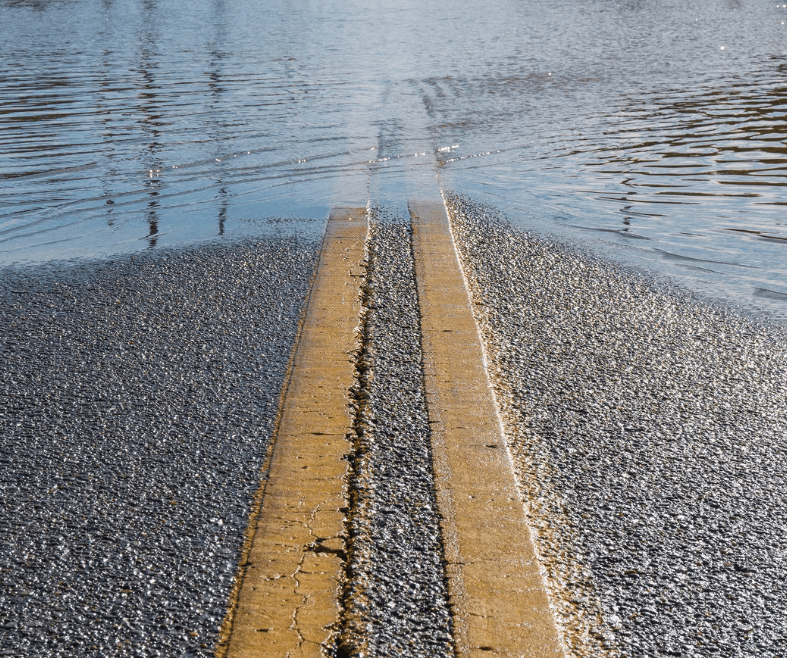 Flooded roadway WahoobyWesternBellePhotography
